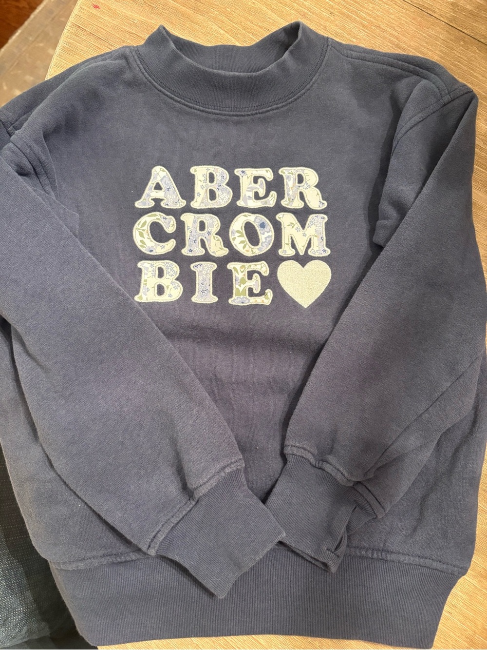 Abercrombie kids Navy Mockneck Sweatshirt with Patterned Cream Logo